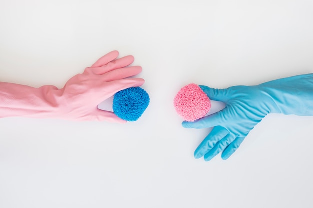 Top view hands with colourful rubber gloves