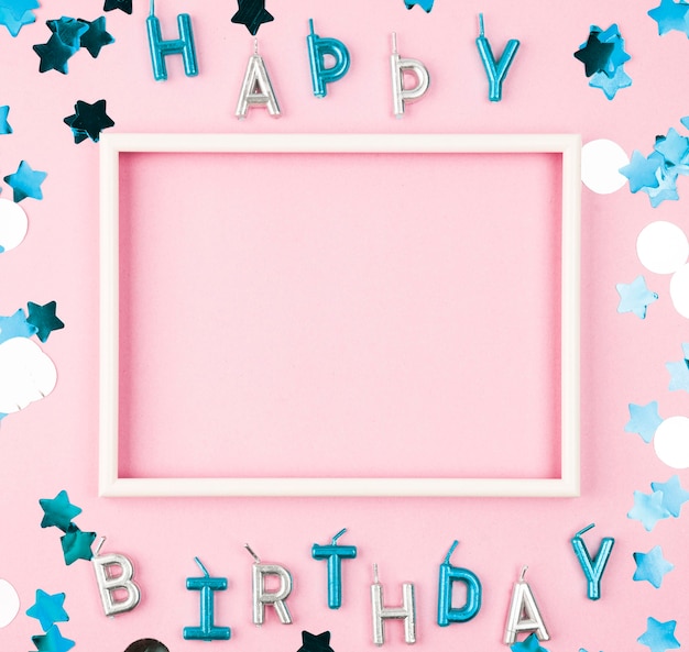 Top view happy birthday candles with frame