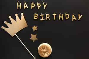 Free photo top view happy birthday message with crown ornament