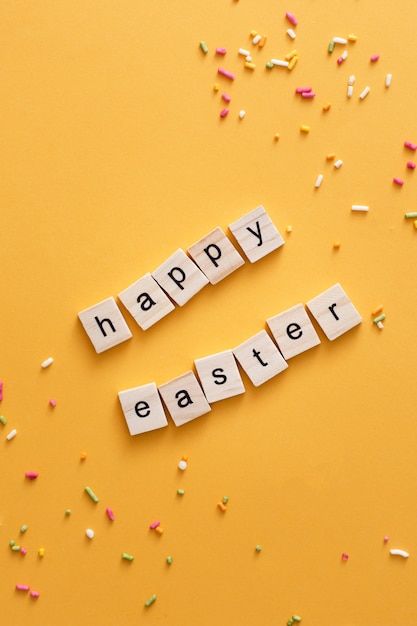 Top view happy easter greeting made out of scrabble