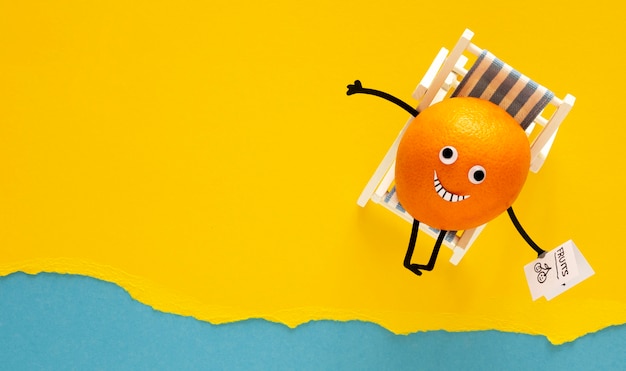 Top view happy orange on deck chair