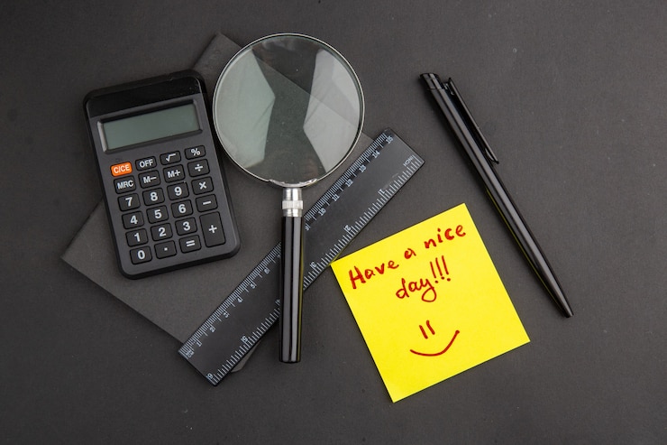 Free Photo top view have a nice day written on yellow sticky note pen ruler lupa calculator notepad on dark