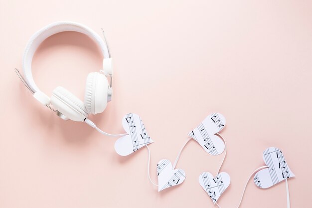 Top view headset on pink background