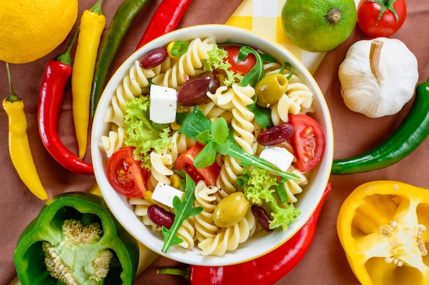 Top view of healthy and appetizing pasta salad