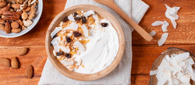 Top view healthy breakfast bowl with oats on the table