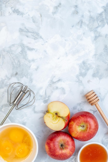 Free photo top view of healthy food set on the bottom on two-toned white blue surface