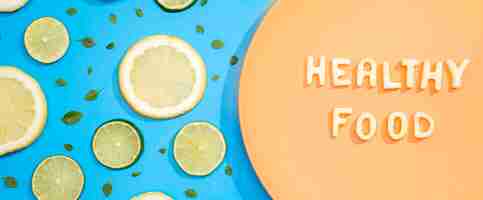 Free photo top view healthy food with lemon and lime