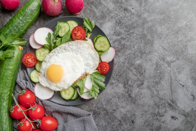 Top view healthy salad with vegetables and egg