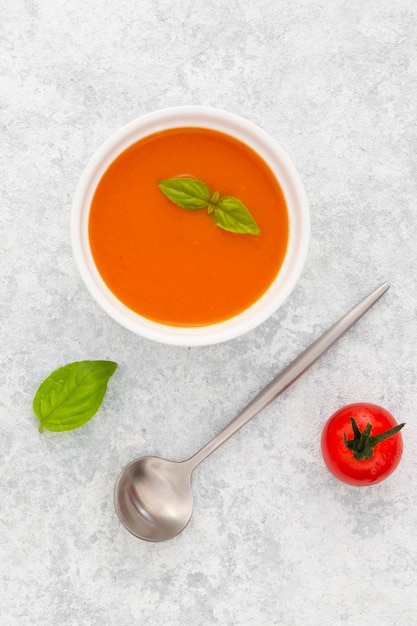 Top view healthy tomato soup on the table