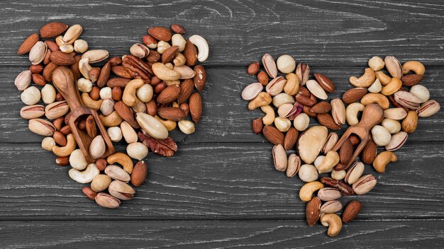 Top view heart shape forms made from nuts