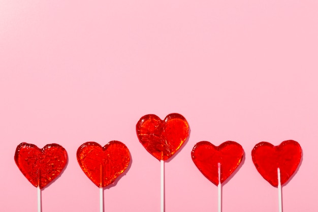 Top view over  heart shaped lollipops