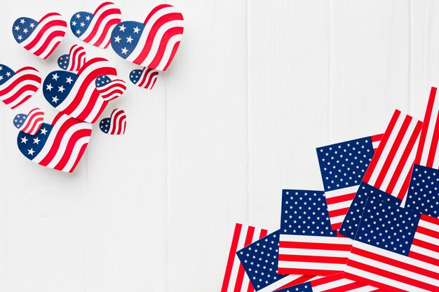 Top view of heart-shaped and regular american flags