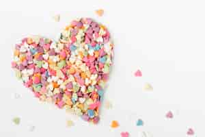 Free photo top view of heart-shaped sprinkles
