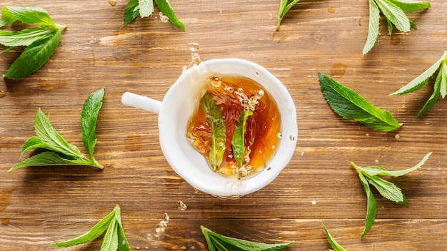 Top view of herbal tea concept on wooden table