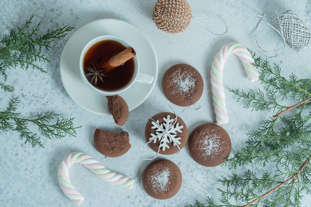 Top view of homemade chocolate cookies with tea.