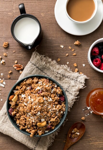 Top view homemade granola with milk