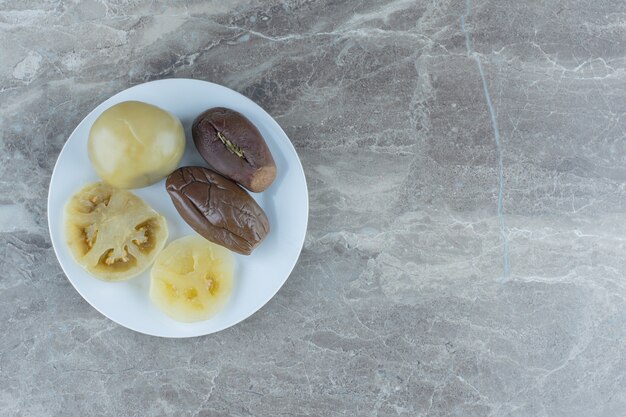 Top view of homemade pickles Eggplant and green tomato. 