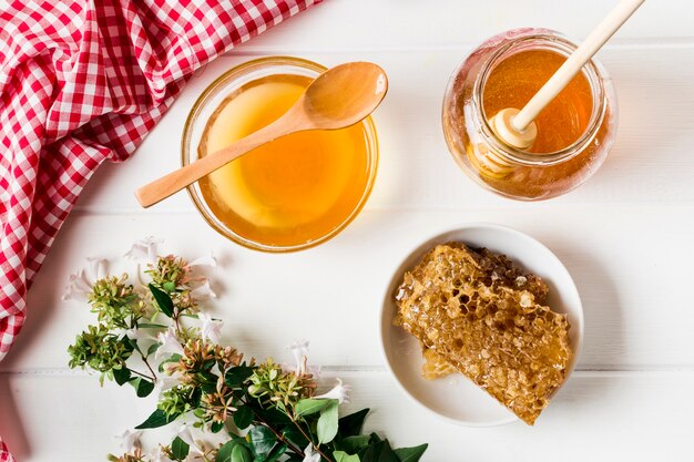 Top view honey containers with honeycomb