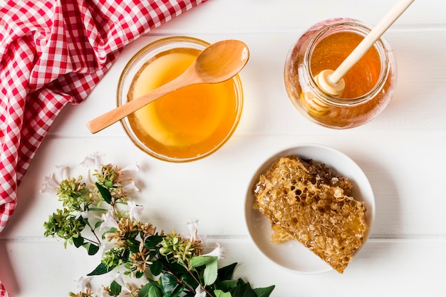 Top view honey containers with honeycomb