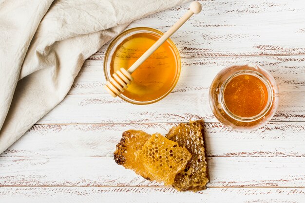 Top view honey jars with honeycomb