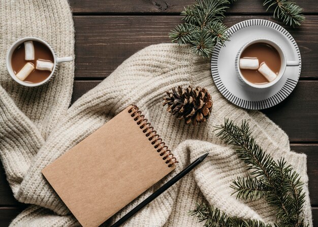 Top view hot chocolate cups with blank agenda