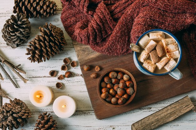 Top view hot chocolate with acorns