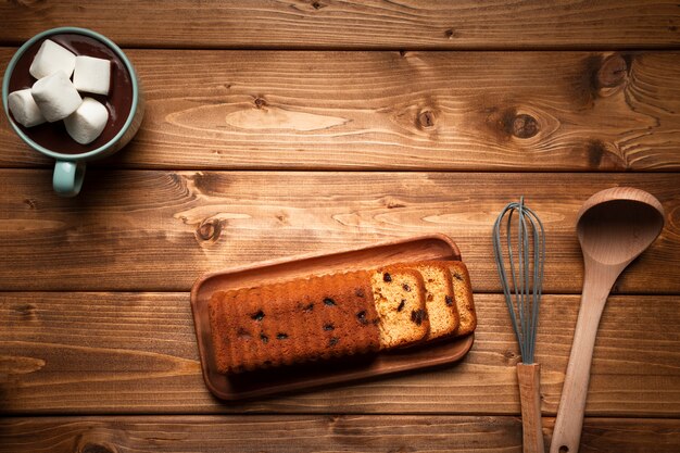 Top view hot chocolate with cake