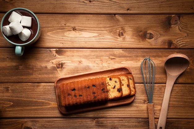 Top view hot chocolate with cake