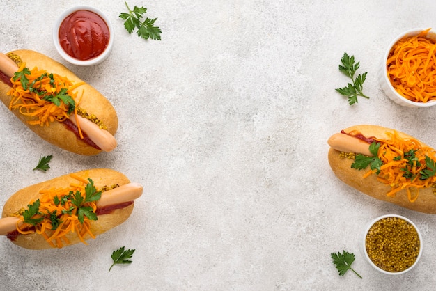 Top view hot dog and sauce arrangement