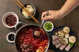 Free photo top view over hotpot dishes