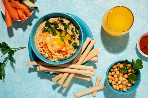 Top view hummus and chickpeas arrangement