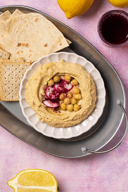 Top view hummus on plate still life