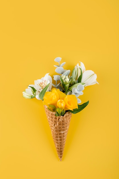 Top view ice cream cone with flowers