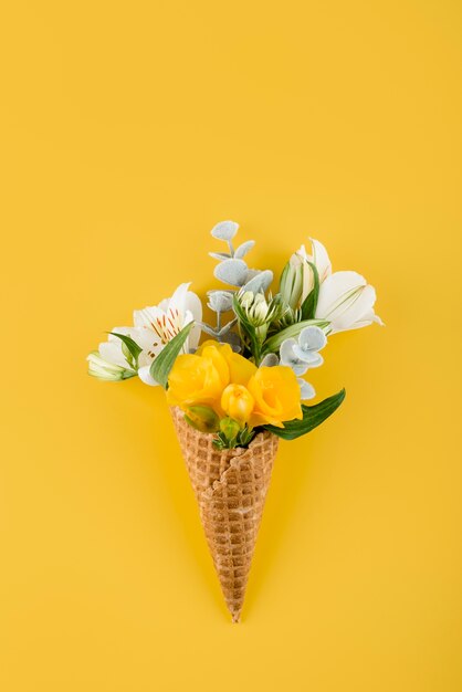 Top view ice cream cone with flowers