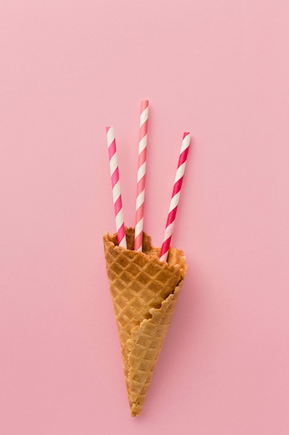 Top view ice cream cone with straws