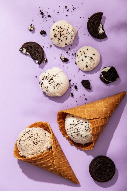 Top view ice cream cones and cookies