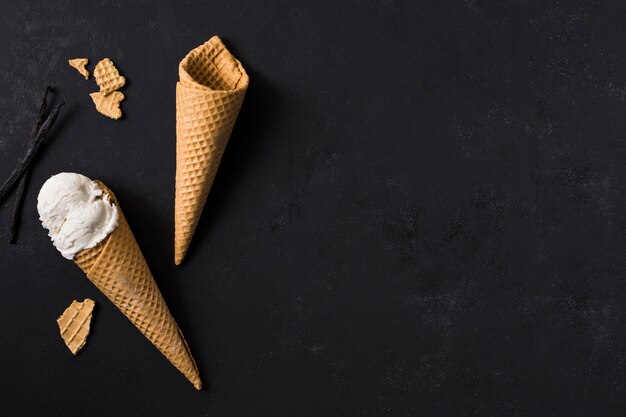 Top view ice cream cones with copy space