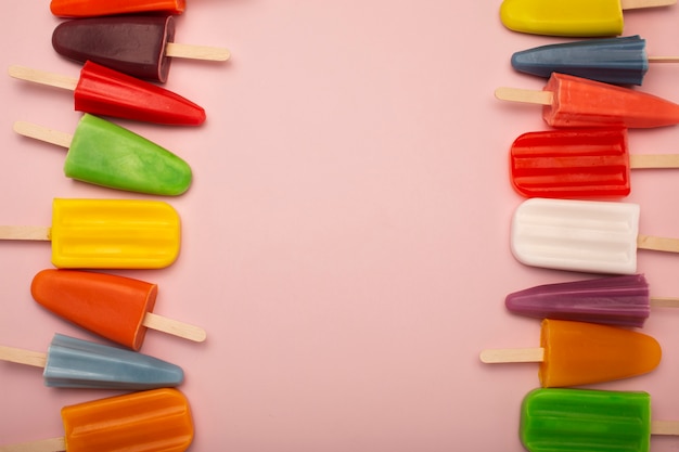 Free photo top view over ice cream pop stickles