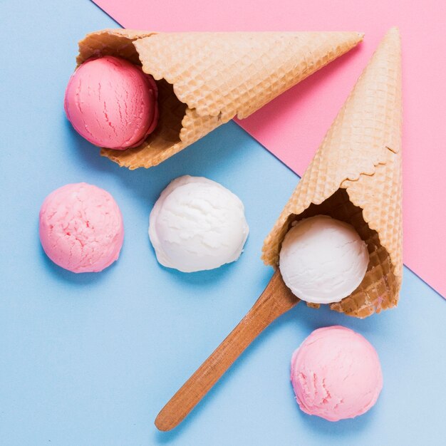 Top view ice cream scoops on cone on table