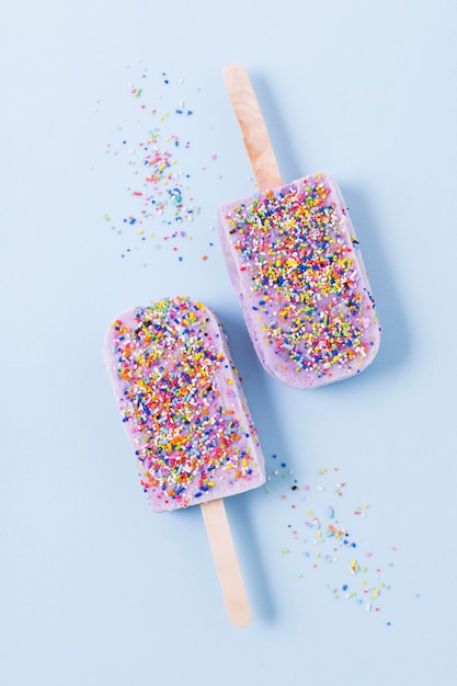 Top view ice cream sticks on table