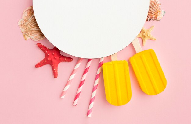 Top view ice cream with straws and starfish