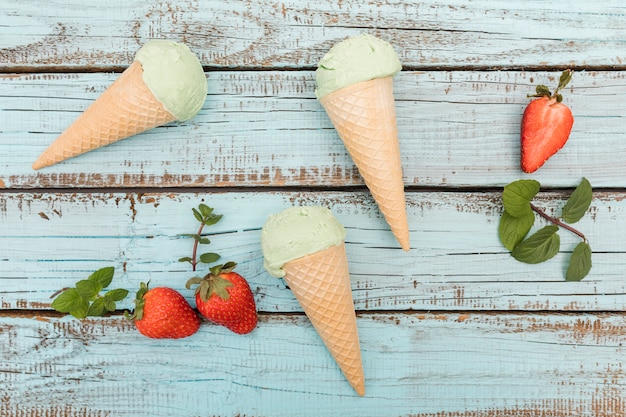 Free photo top view ice creams with fruits