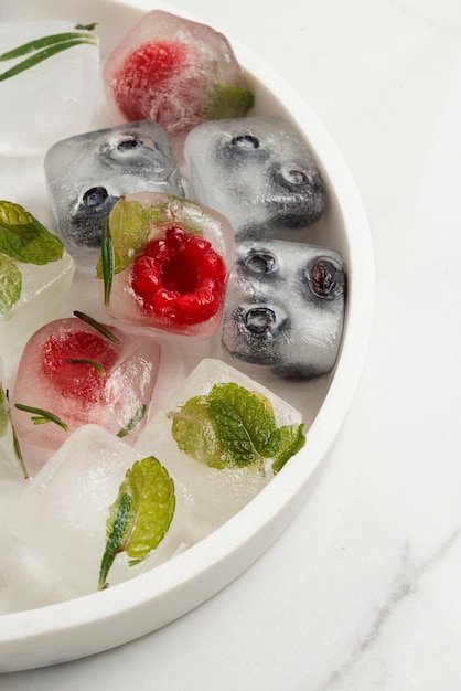 Top view  ice cubes with fruits