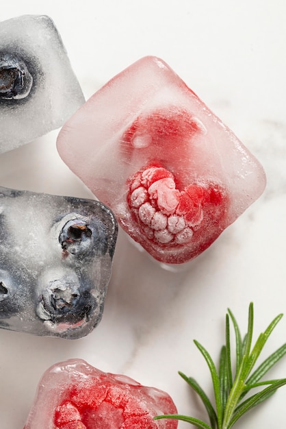 Top view  ice cubes with fruits