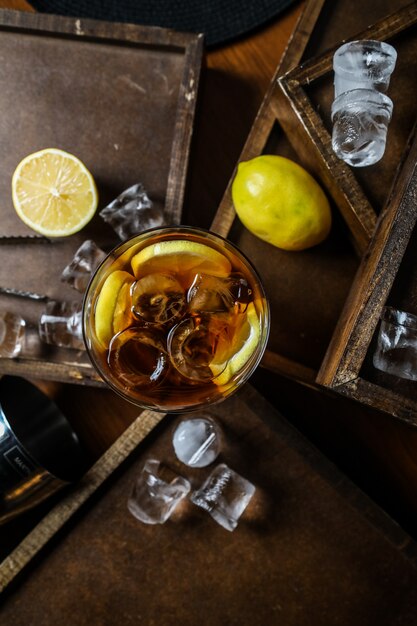 Top view iced tea with lemon in a glass