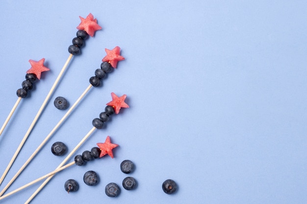 Top view independence day fruit skewers with copy-space