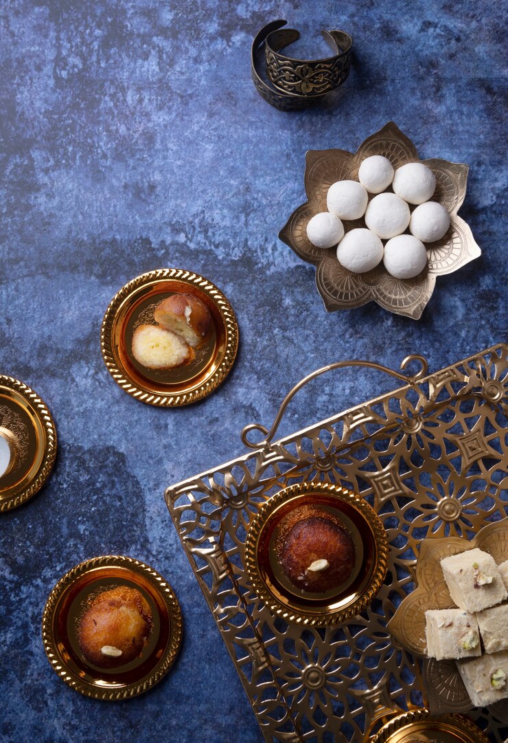 Free Photo top view indian dessert and drinks arrangement