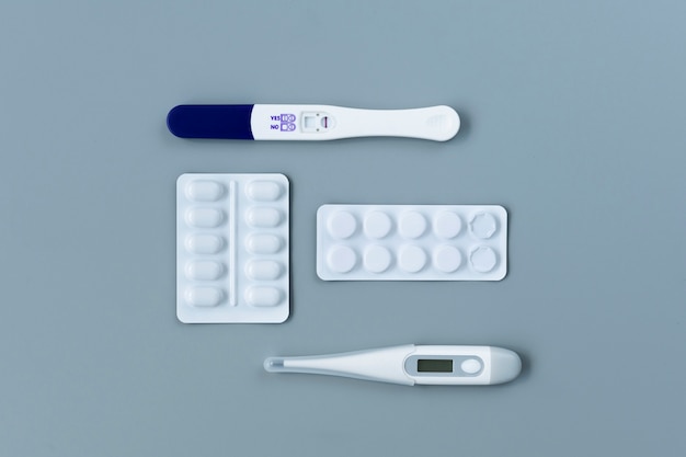 Top view over infertility proof near pills