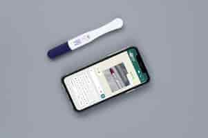 Free photo top view over infertility proof with phone