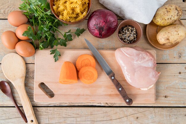 Top view ingredients for soup and meat